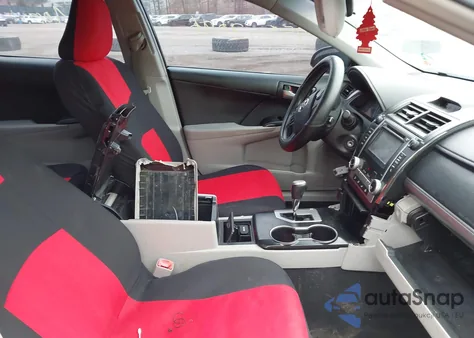 2014 Toyota Camry Le z USA, uszkodzony, nr VIN 4T4BF1FK2ER380577